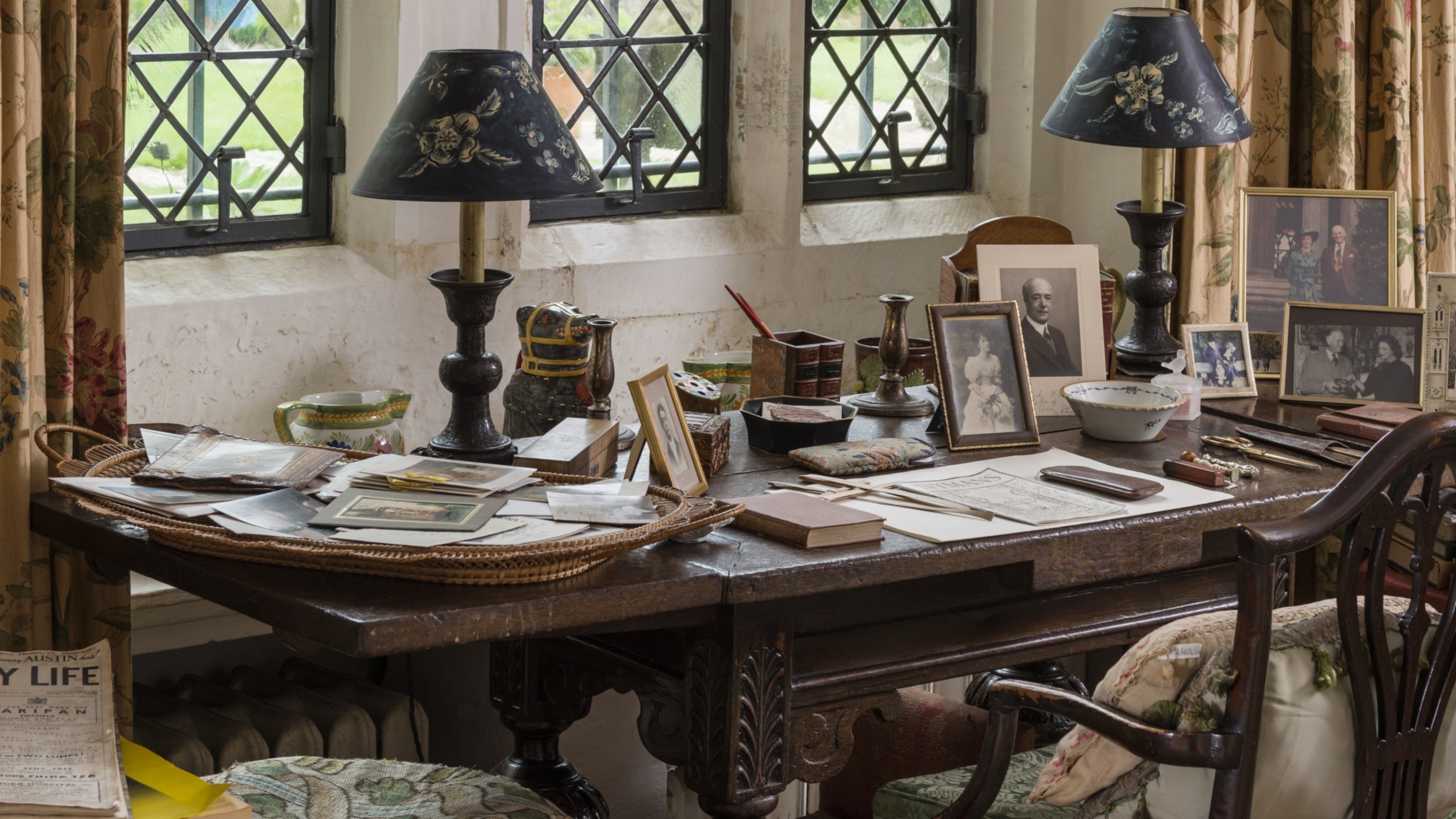 Anne Messel's desk beneath the window in The Library, Nymans, West Sussex. Anne, later Lady Rosse, was the the granddaughter of Ludwig Messel, who bought the Nymans Estate in the 1890s, extending the house and founding its stunning gardens.