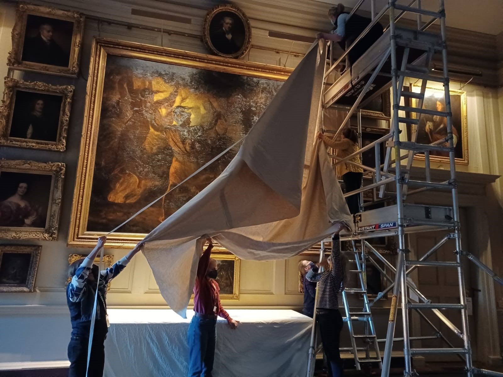 Covering the Macbeth Painting in the Square Dining Room of Petworth House, West Sussex
