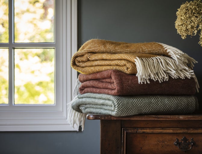 Pile of folded cosy throws