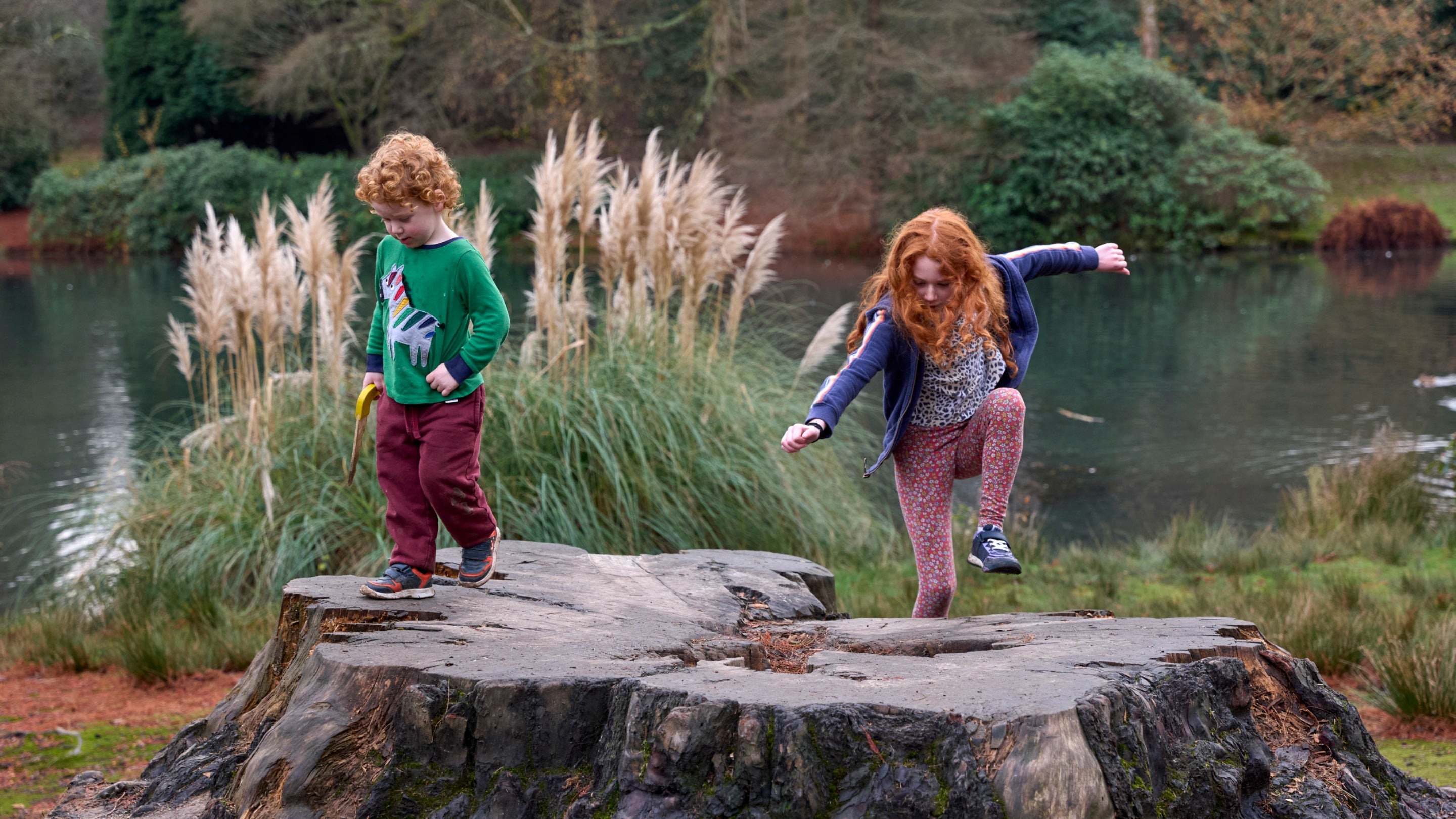 Children playing in the garden at Sheffield Park, East Sussex