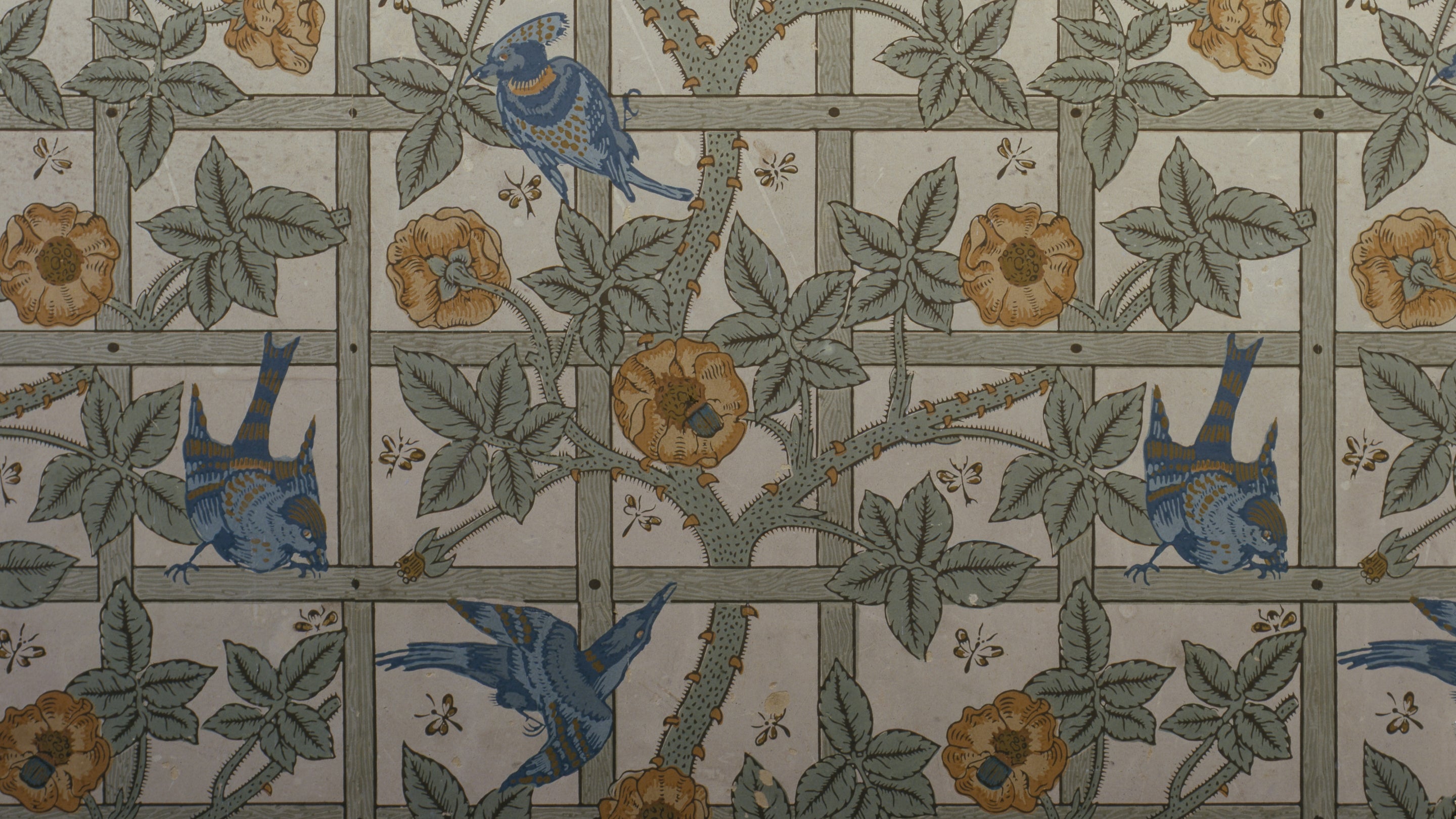 Trellis wallpaper by William Morris featuring flowers and birds, Standen.