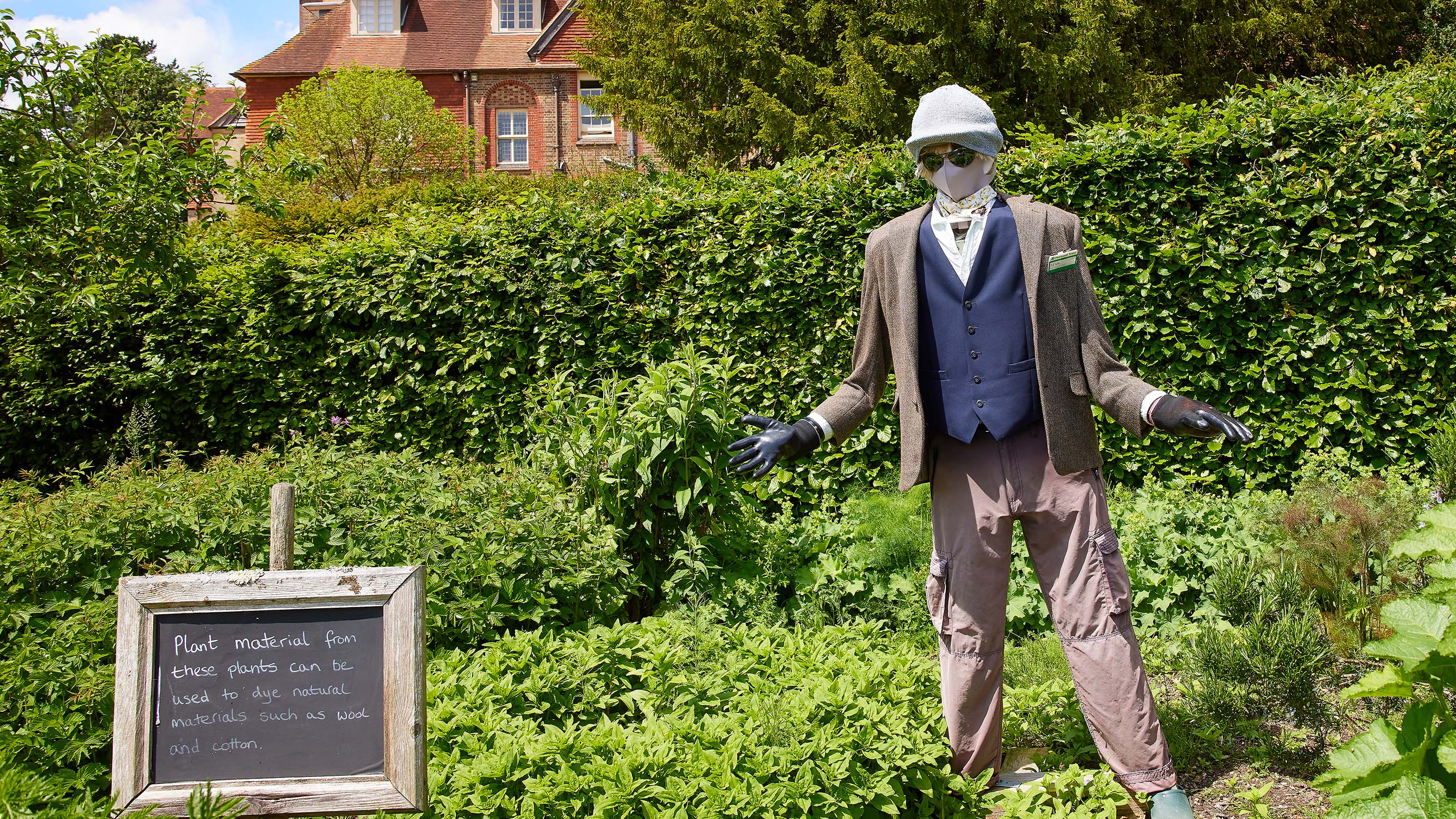 A scarecrow is seen in the Kitchen Garden at Standen in West Sussex