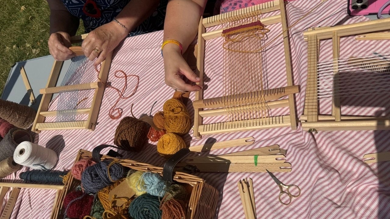 Sussex Craft Studios at Standen this summer - image of hands demonstrating hand weaving