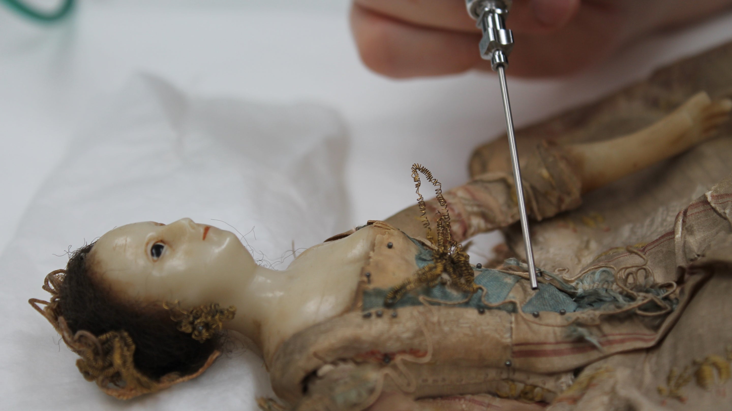 Doll being conserved at the Textile Conservation Studio, Norfolk