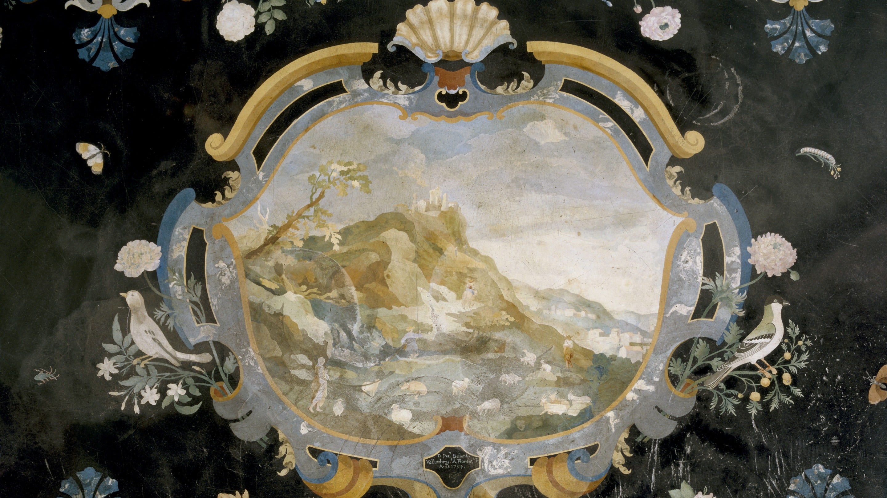 Scagliola tabletop with an inlaid design of a landscape and flowers at Uppark, West Sussex, by Pietro Belloni Vallombrosano Fiorentino.