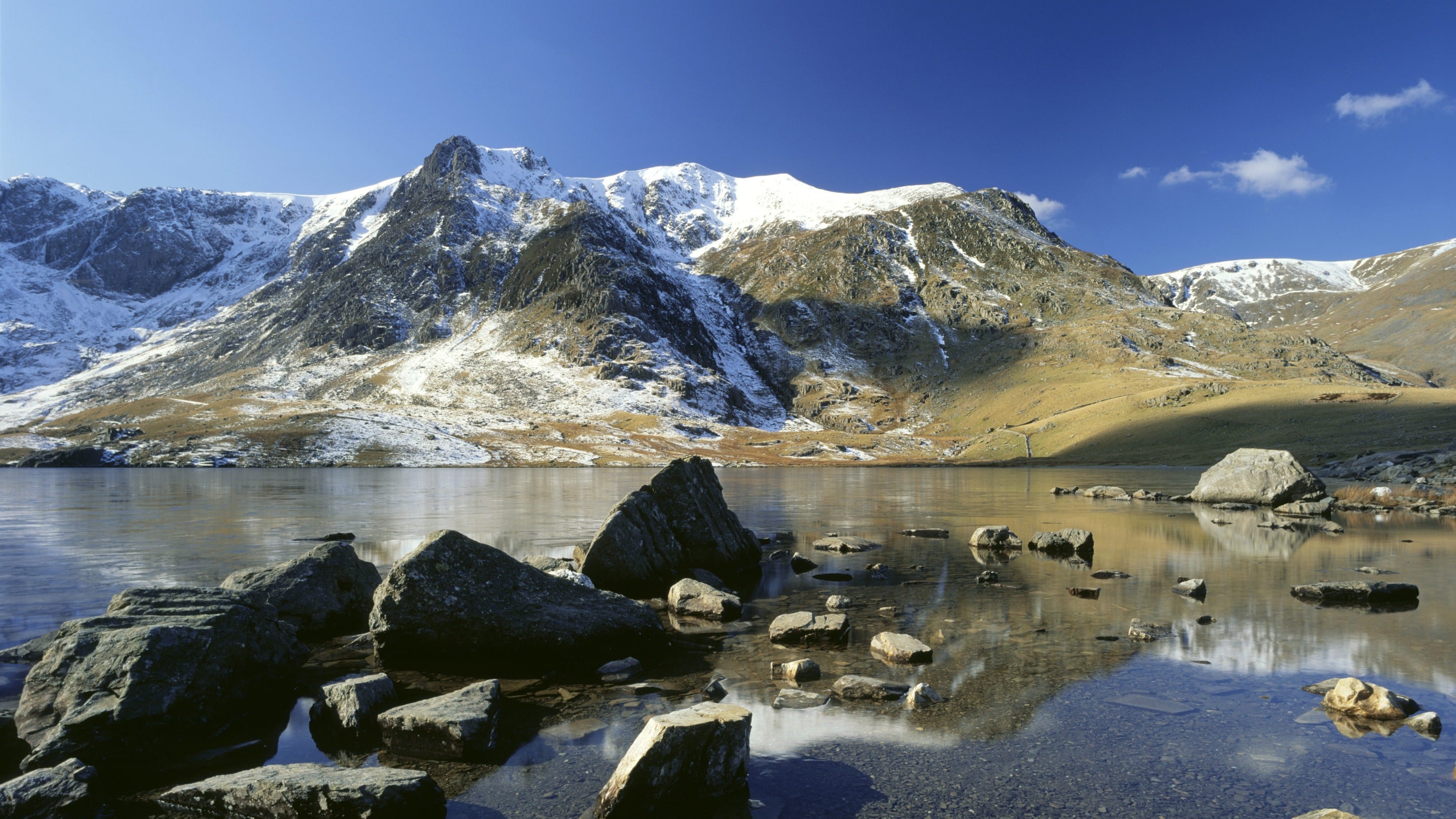 Llyn Idwal with Y Garn, capped with snow at Eryri (Snowdonia), Gwynedd