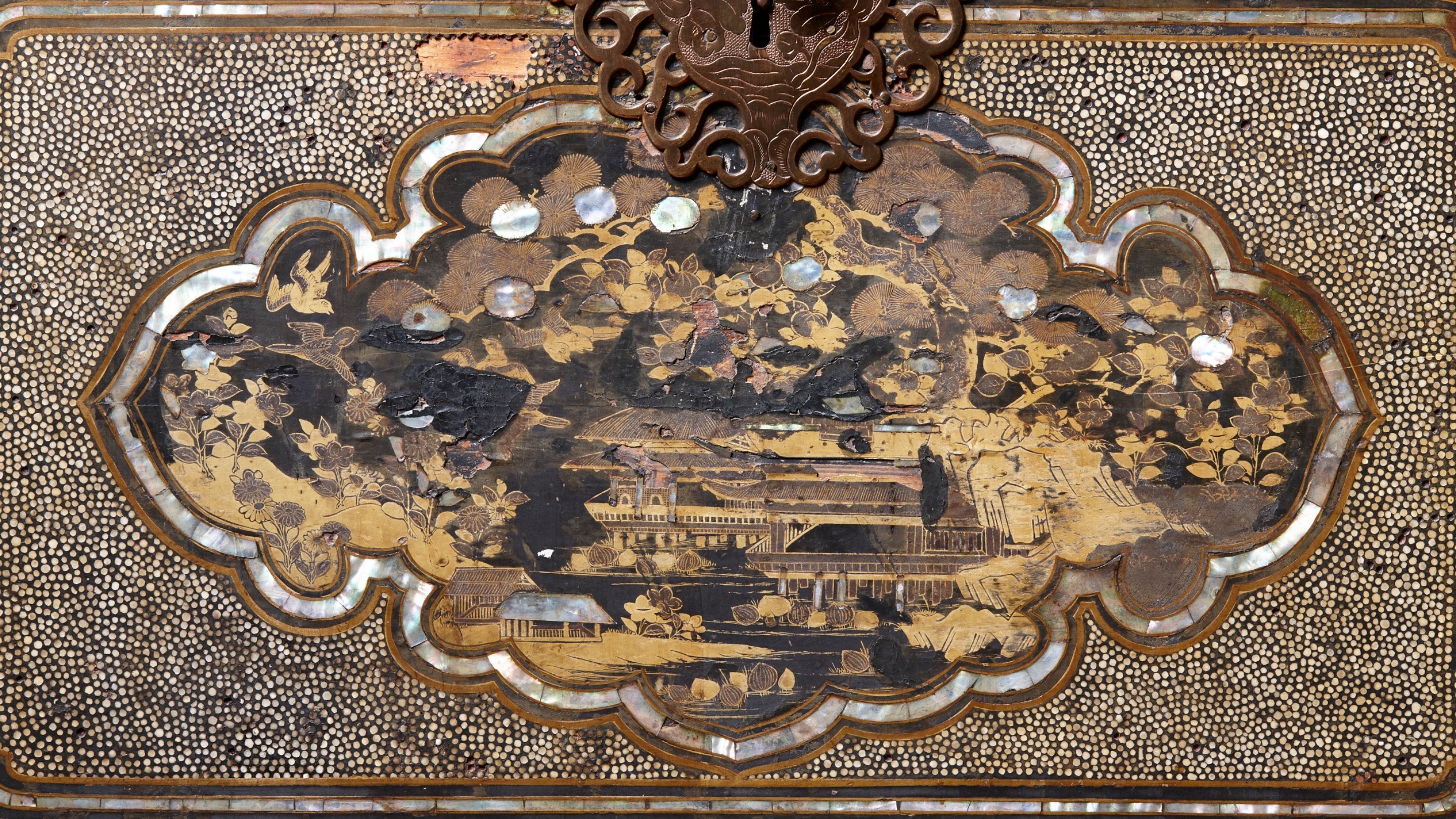 A close-up of the detailed design on the shark-skin covered Japanese chest at Chirk Castle.