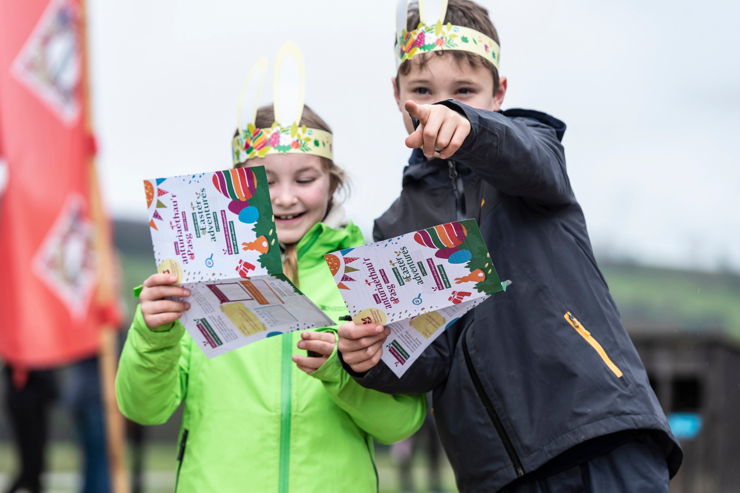 A family enjoying the Easter trail in the garden at Chirk Castle
