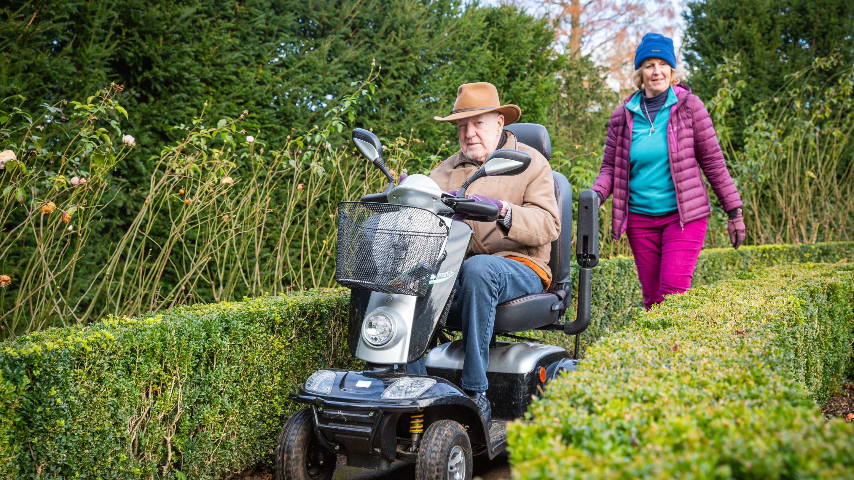 Visitors walking in the wintry Dyffryn Gardens, Vale of Glamorgan