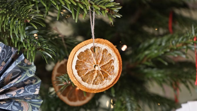 Volunteer-made orange slice Christmas decoration at the Dyffryn Gardens Christmas event