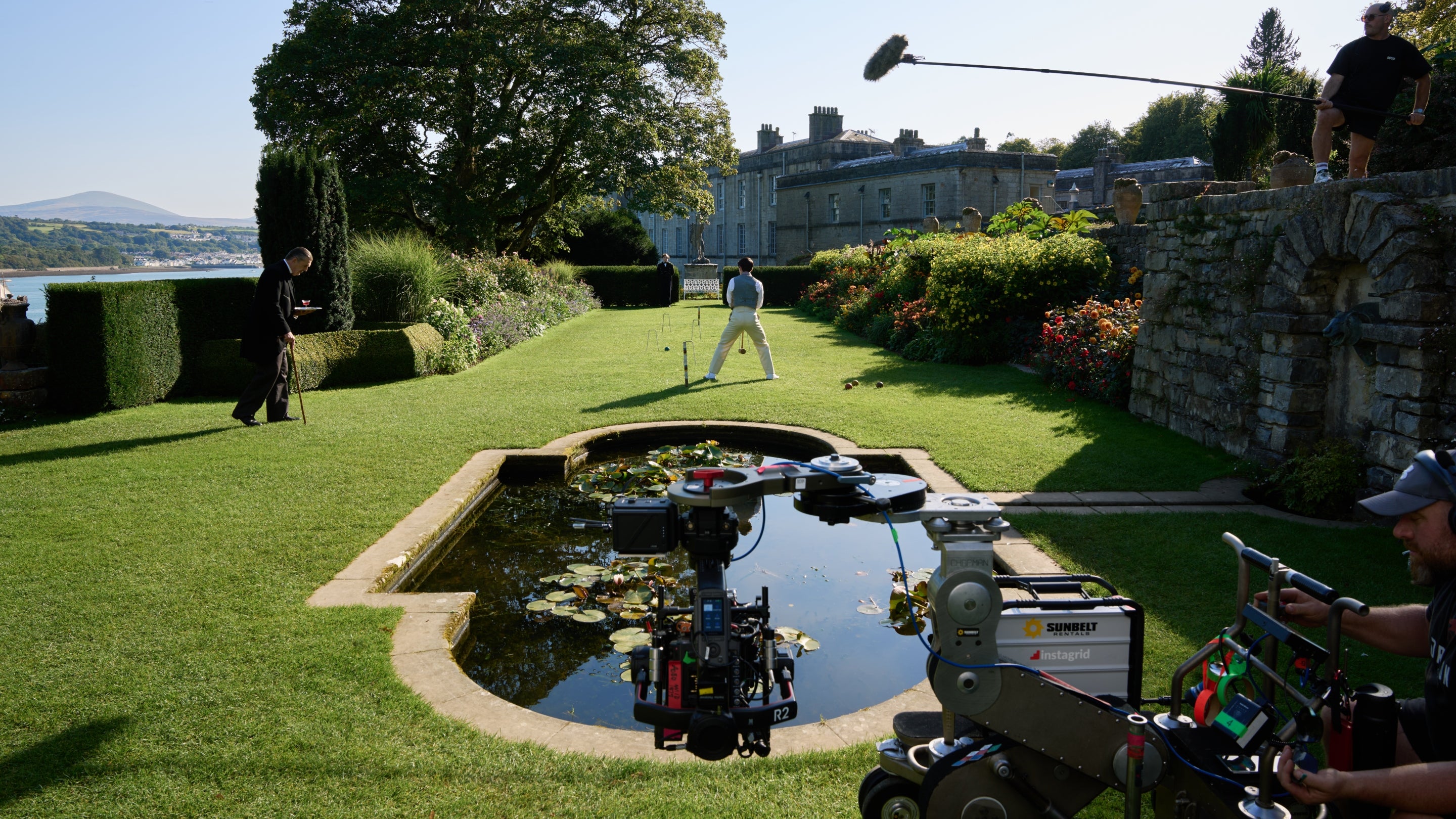 Callum Scott Howells and Rupert Everett filming Madfabulous on the terraces at Plas Newydd
