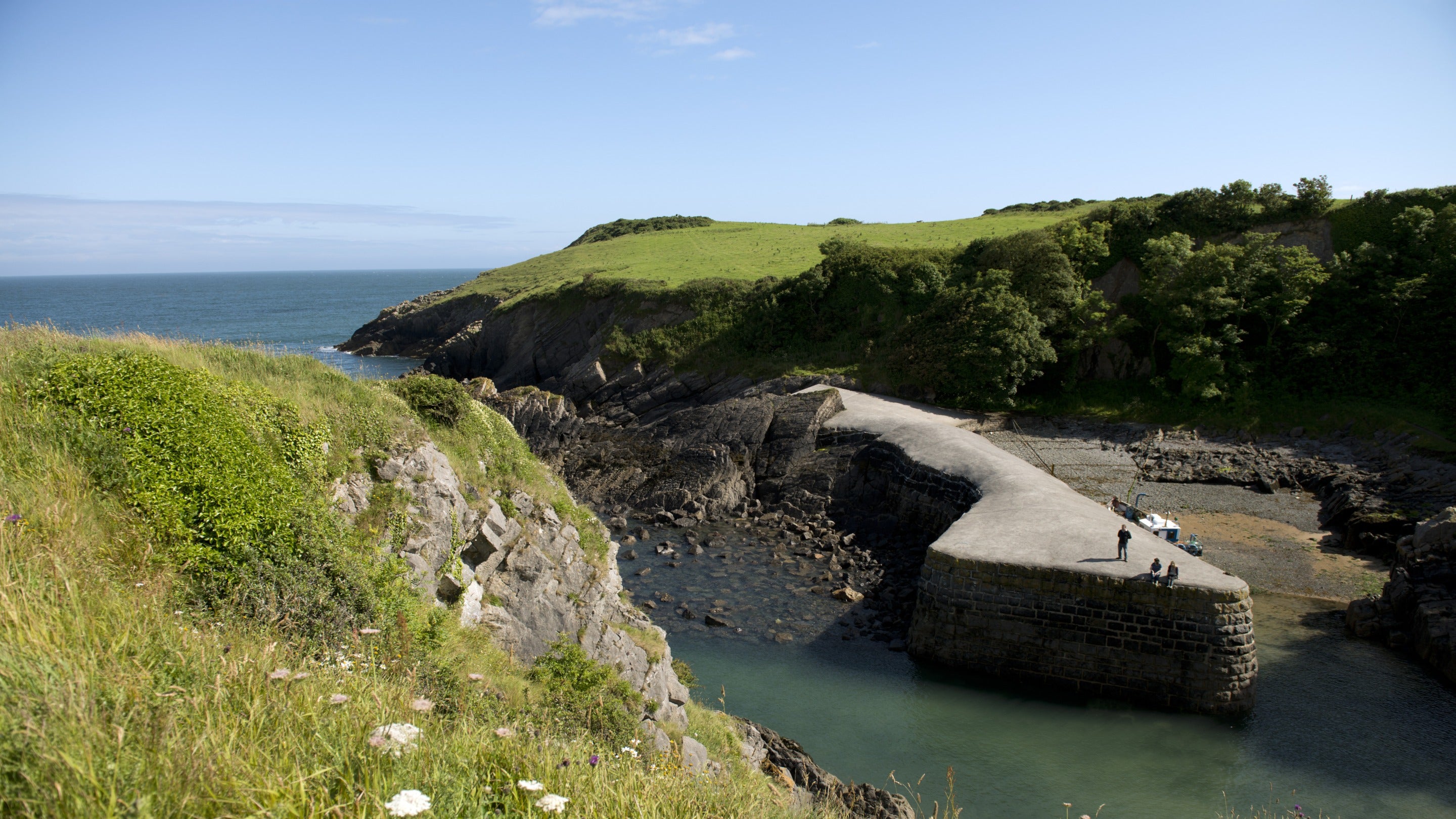 Visitors at Stackpole Quay, Pembrokeshire, Wales.