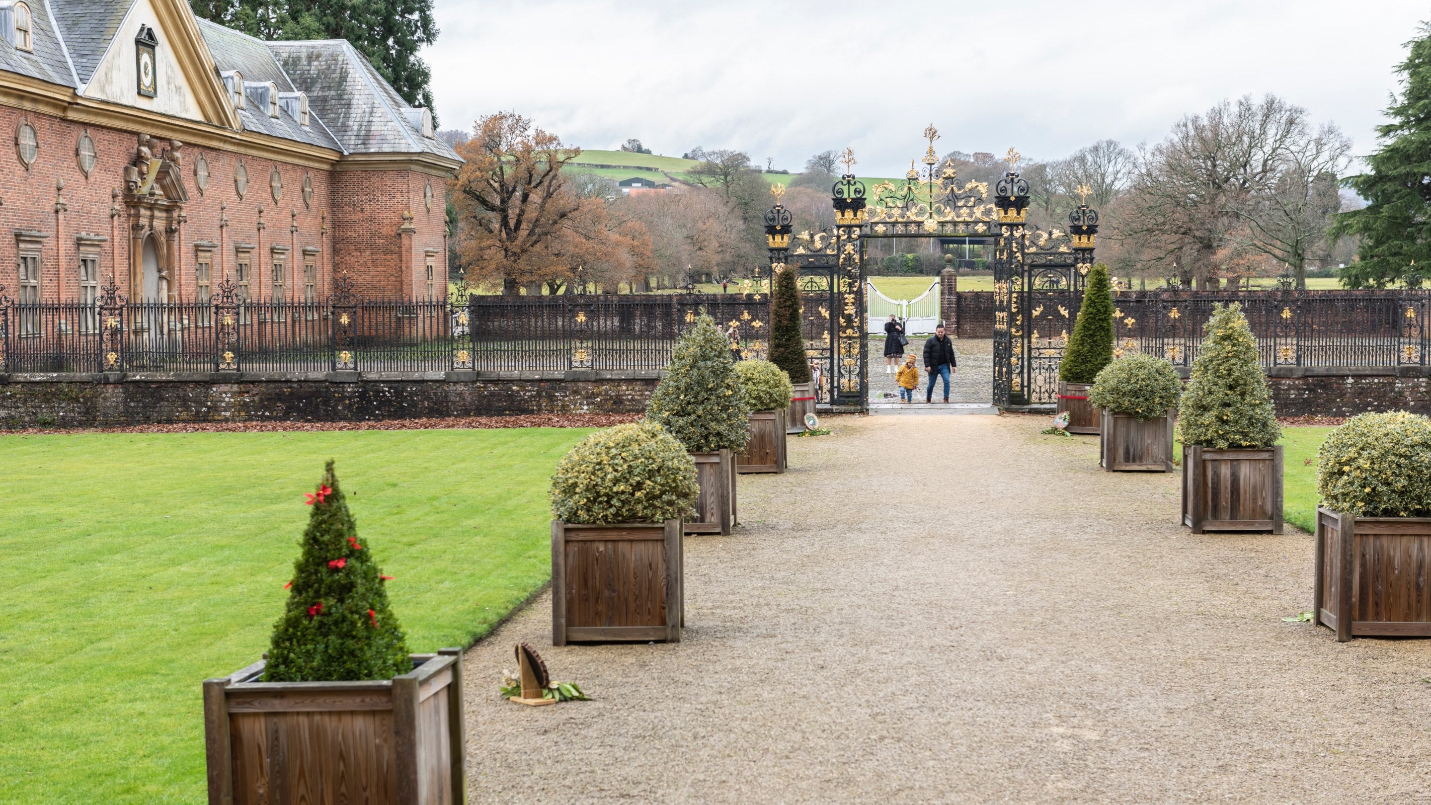 Visitors in the garden in winter, Tredegar House, Newport, Wales