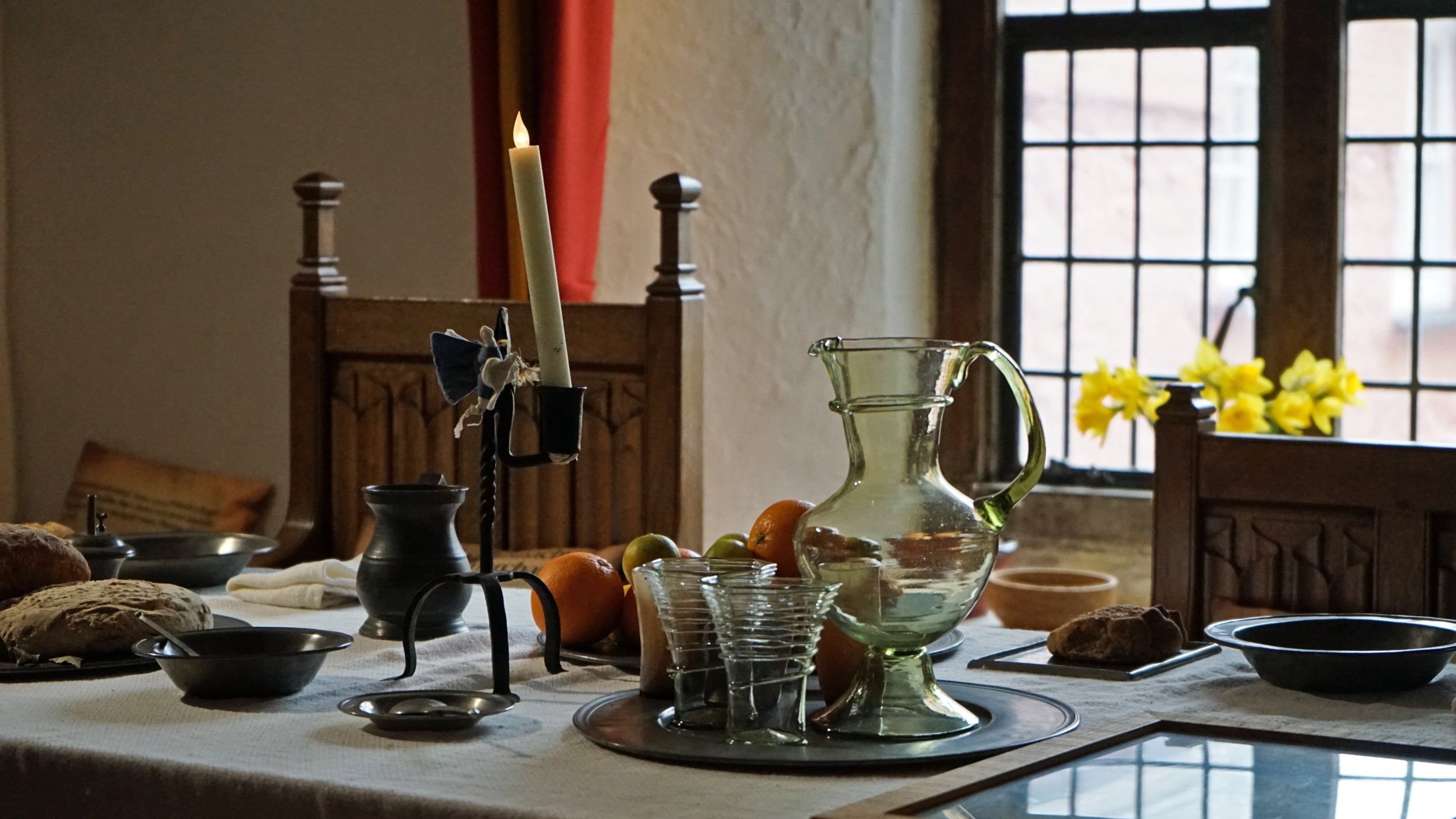 See the Hall Chamber in the Tudor Merchant's House, Tenby