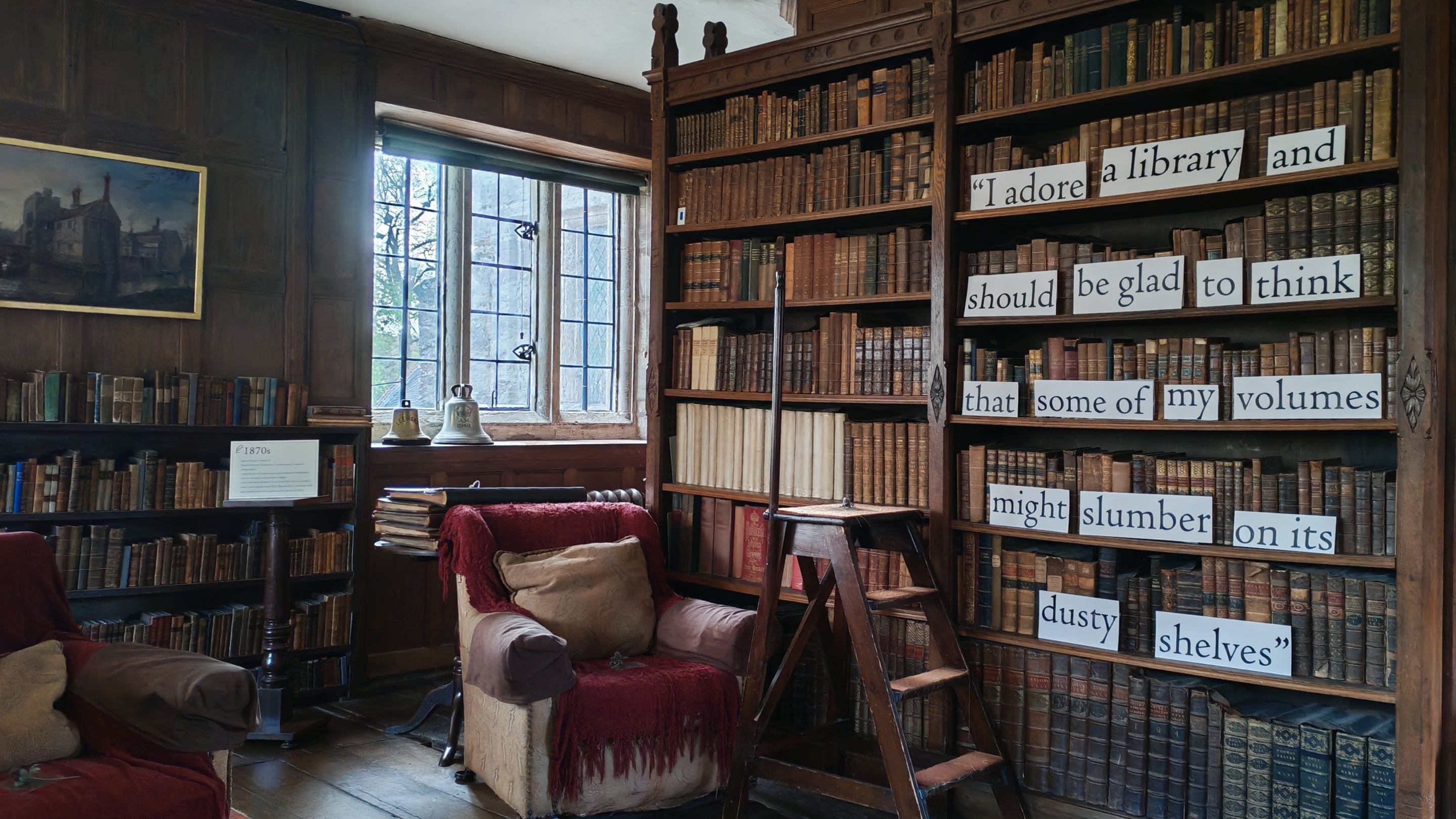 The Library at Baddesley Clinton, Warwickshire, with an installation for the exhibition about Georgiana, Lady Chatterton.