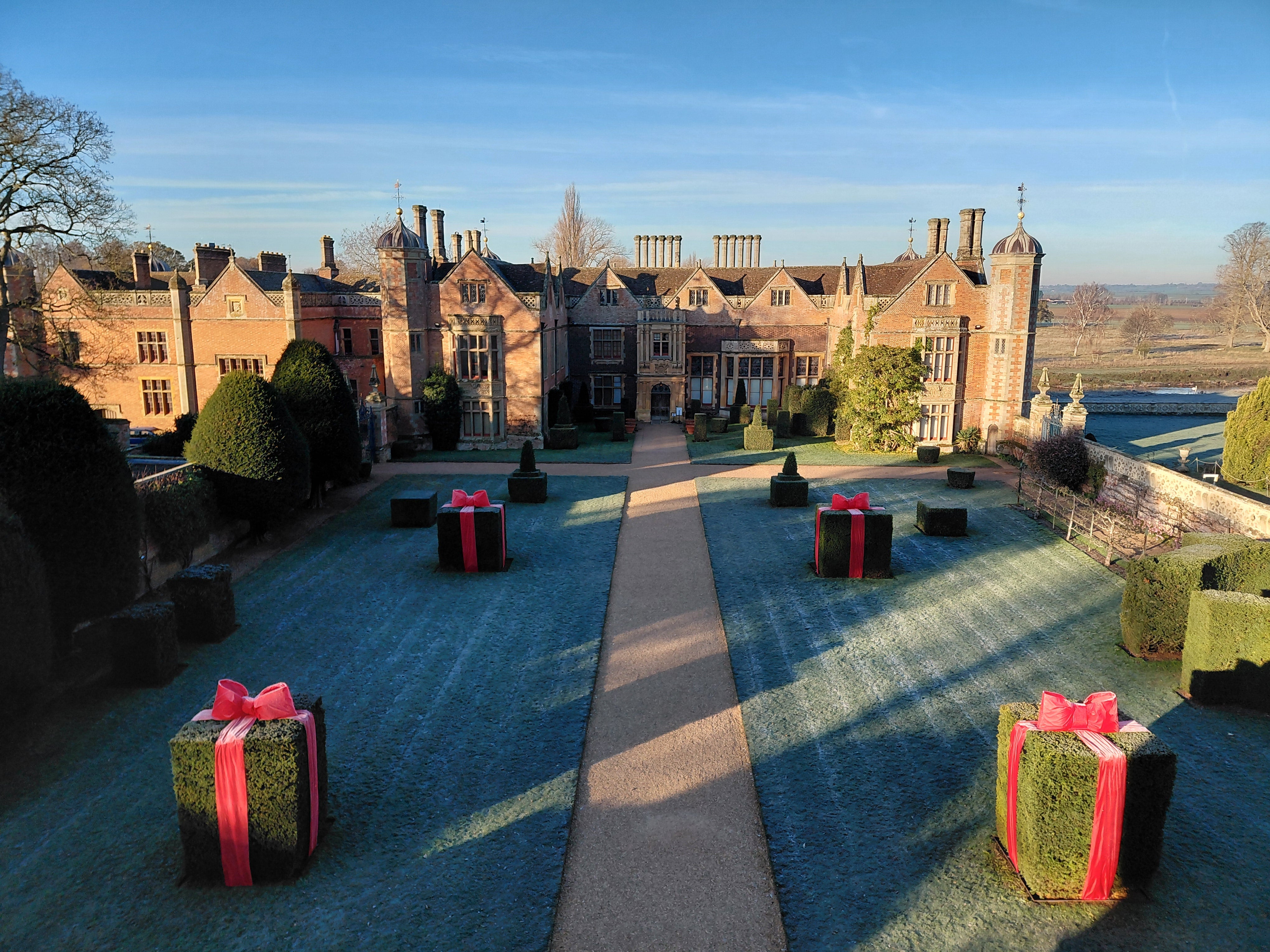 Charlecote House and Green Court decorated for Christmas, bird's eye view from the Gatehouse