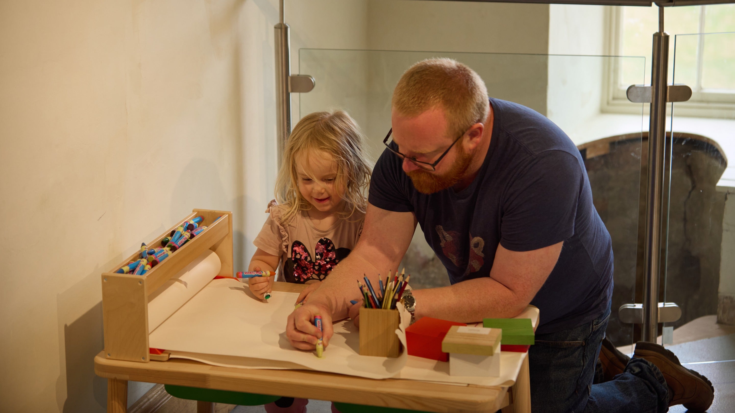 A family in the activity room at Charterhouse