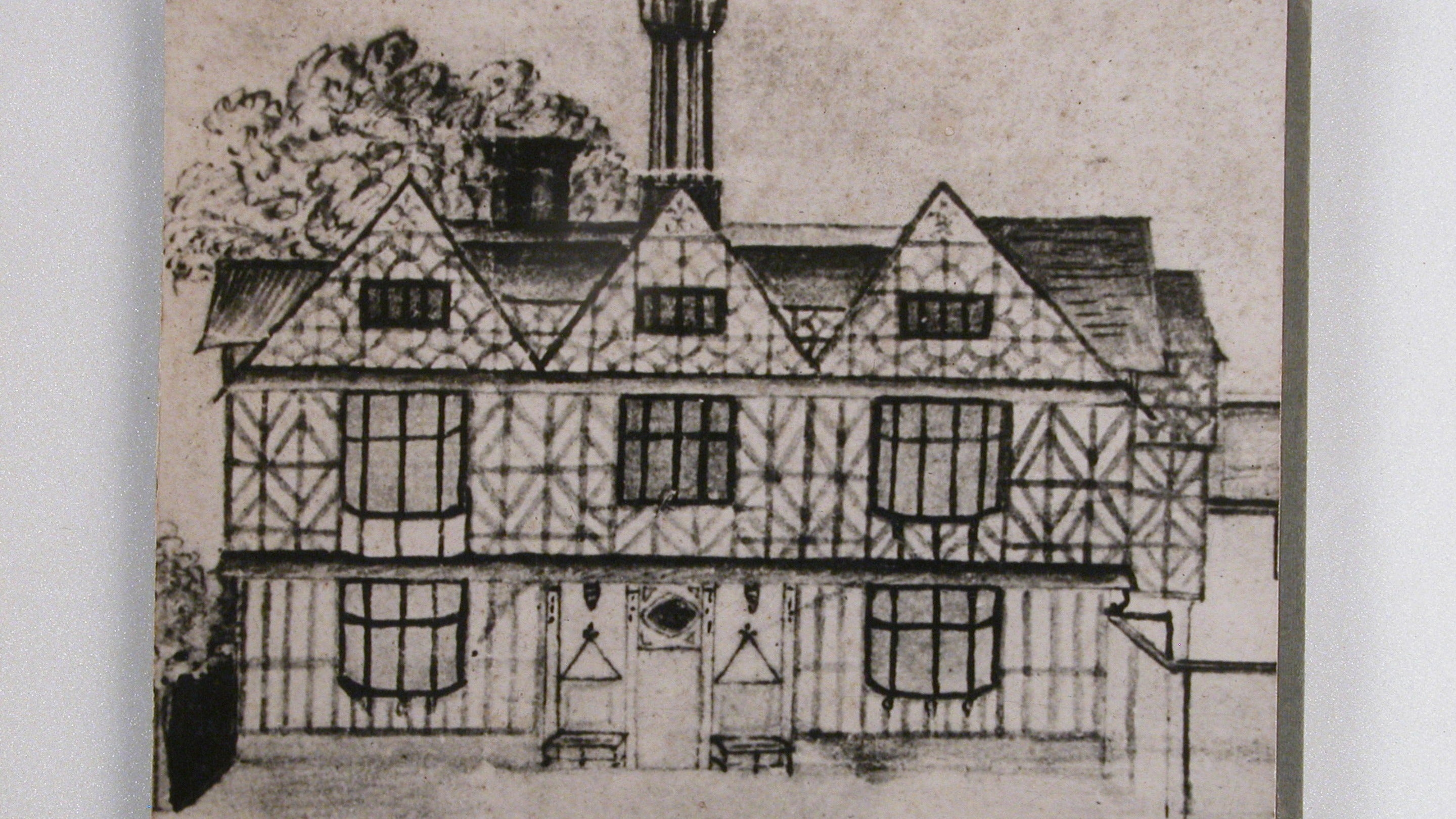 An historic drawing of Packwood House showing the original timbering on the exterior of the house.