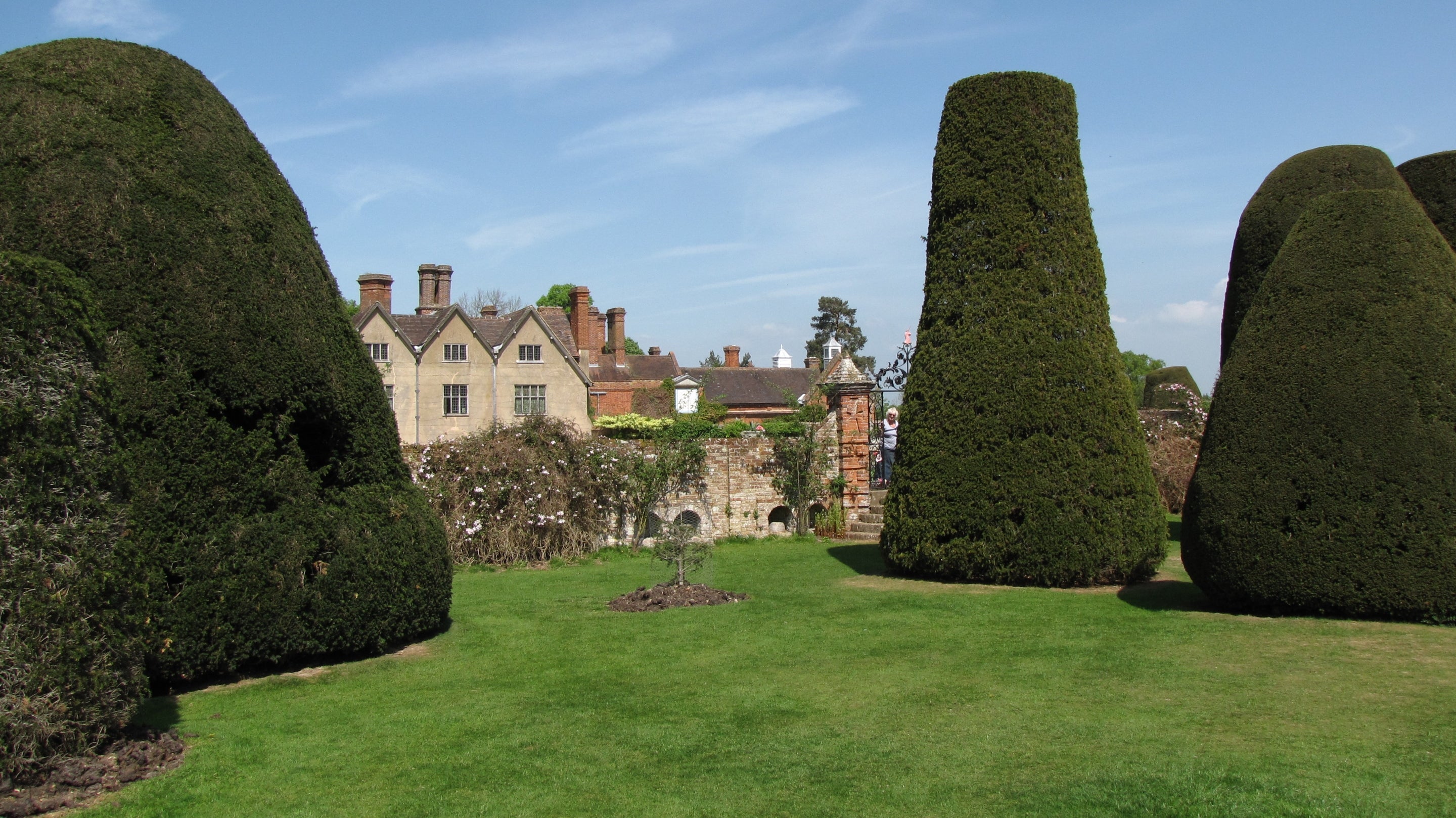 A view of the house from the yew garden in spring at Packwood, Warwickshire