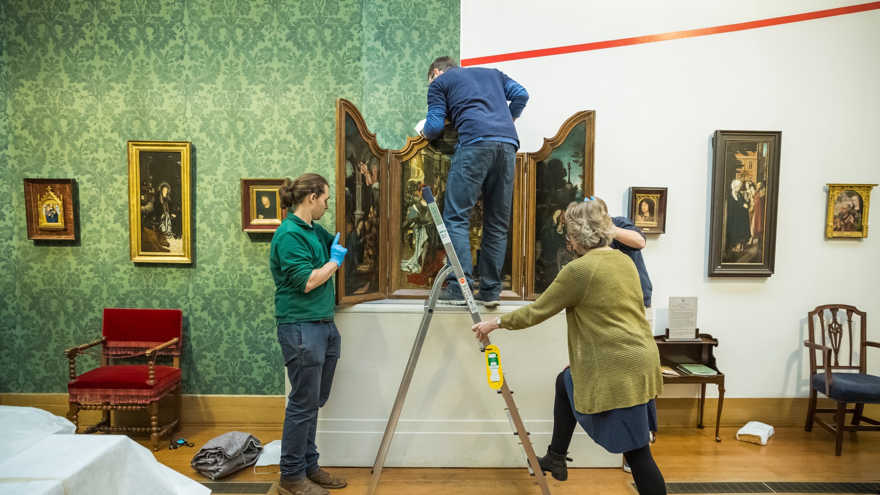 The Adoration of the Magi (Triptych) and Christ before Pilate (Verso) attributed to Hieronymus Bosch being packed up to be sent out on loan, Upton House, Warwickshire