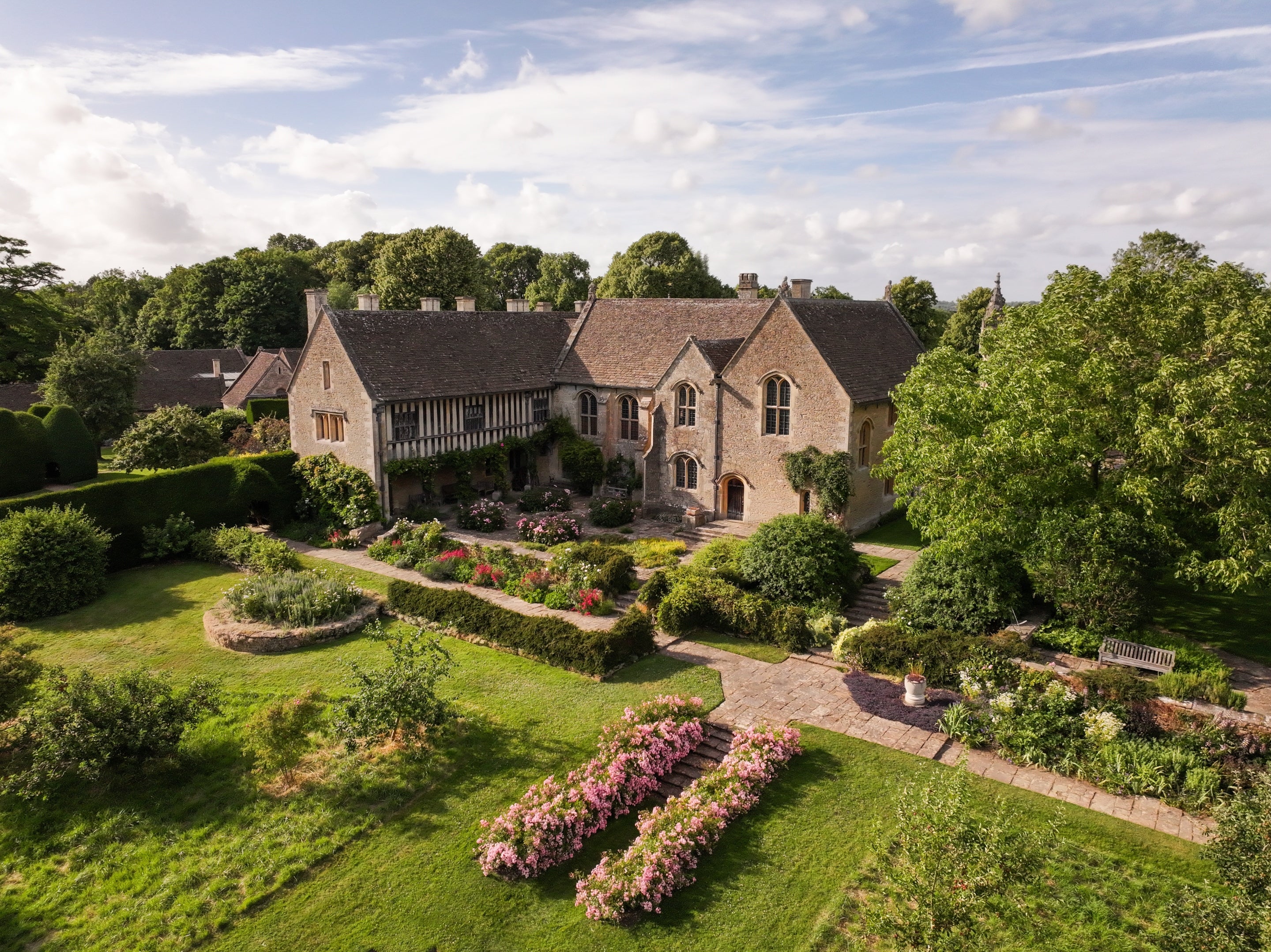 An aerial view of Great Chalfield Manor and Garden in early summer, Wiltshire