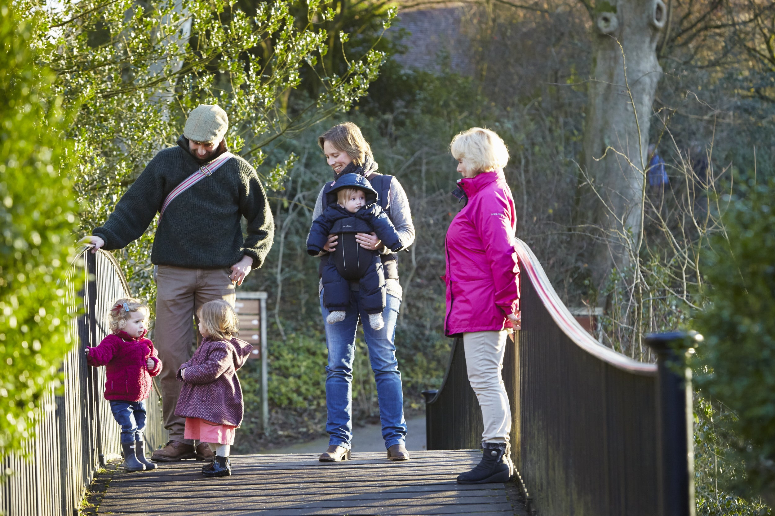 A family visiting Stourhead during the winter