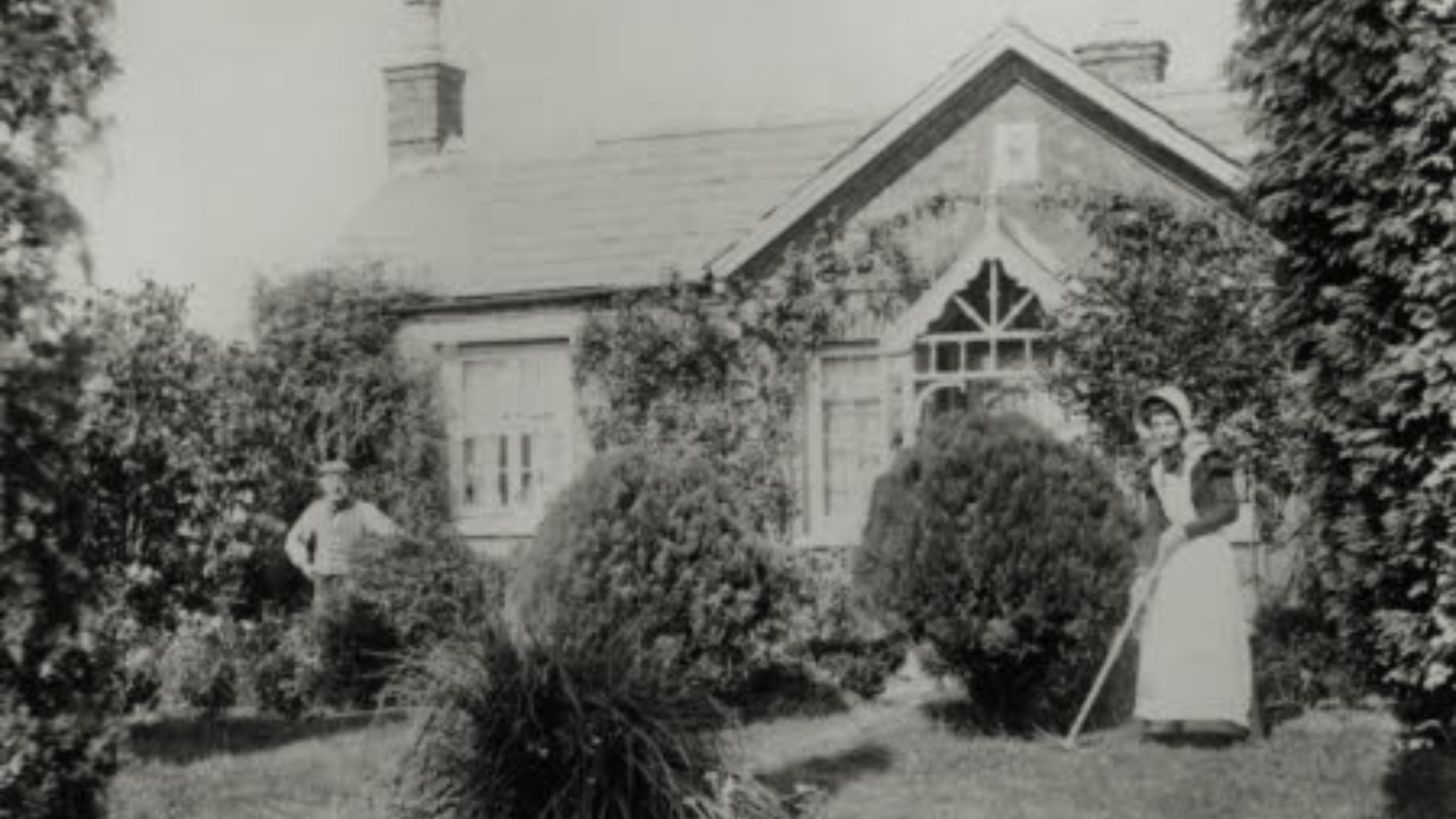 Mr Baker and daughter outside their cottage at Rosedene, Worcestershire