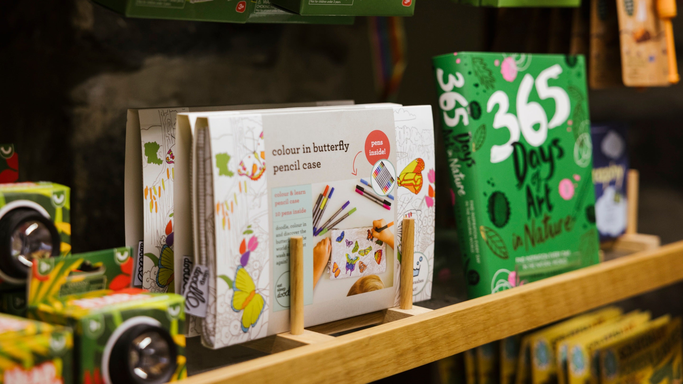 An open book on a shelf in a National Trust gift shop