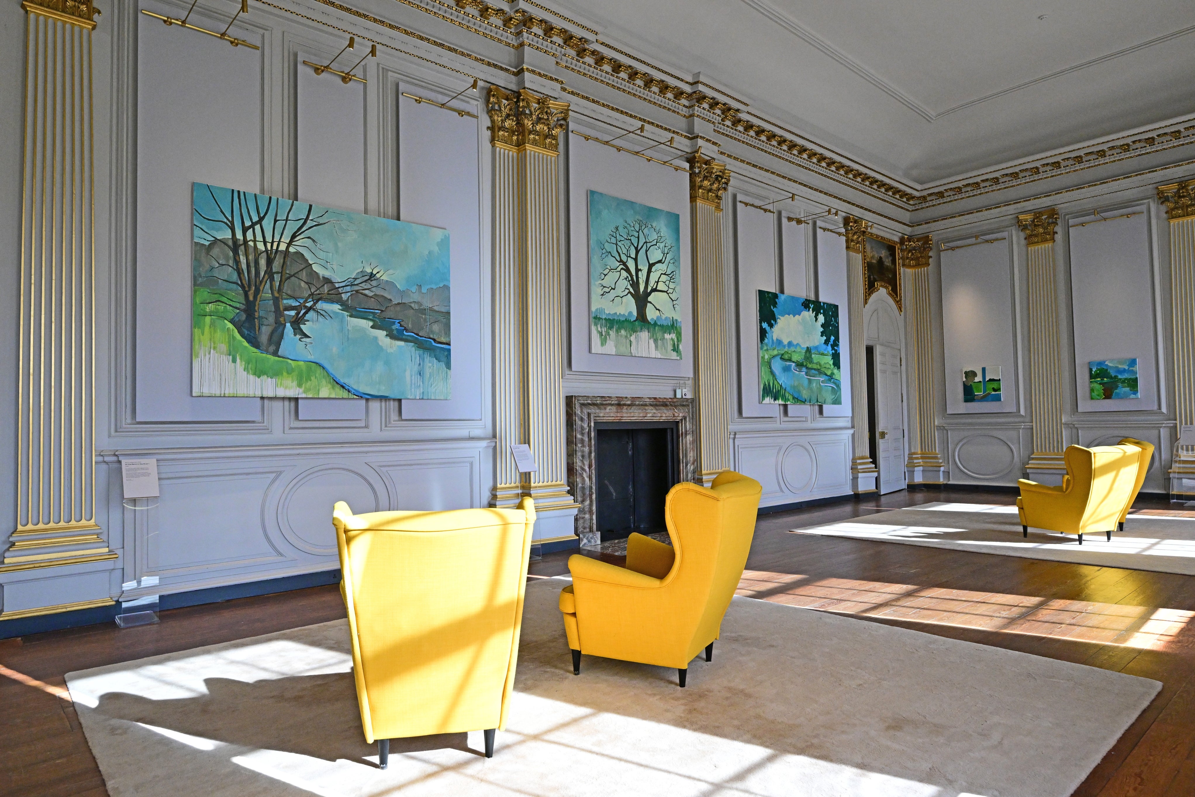 Paintings hang in the saloon gallery at Beningbrough