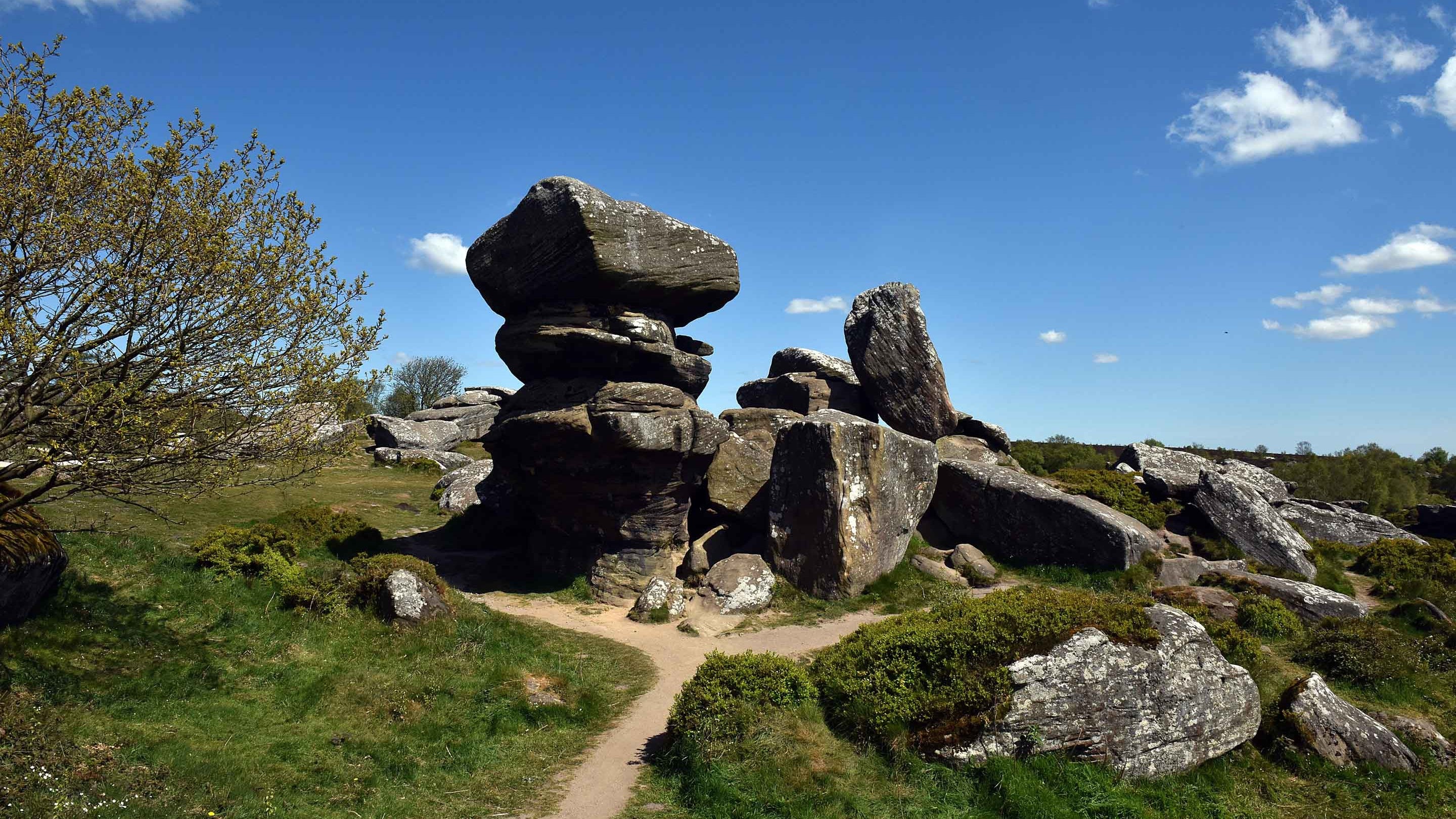 Stacked rock formation at Brimham Rocks, with blue sky above
