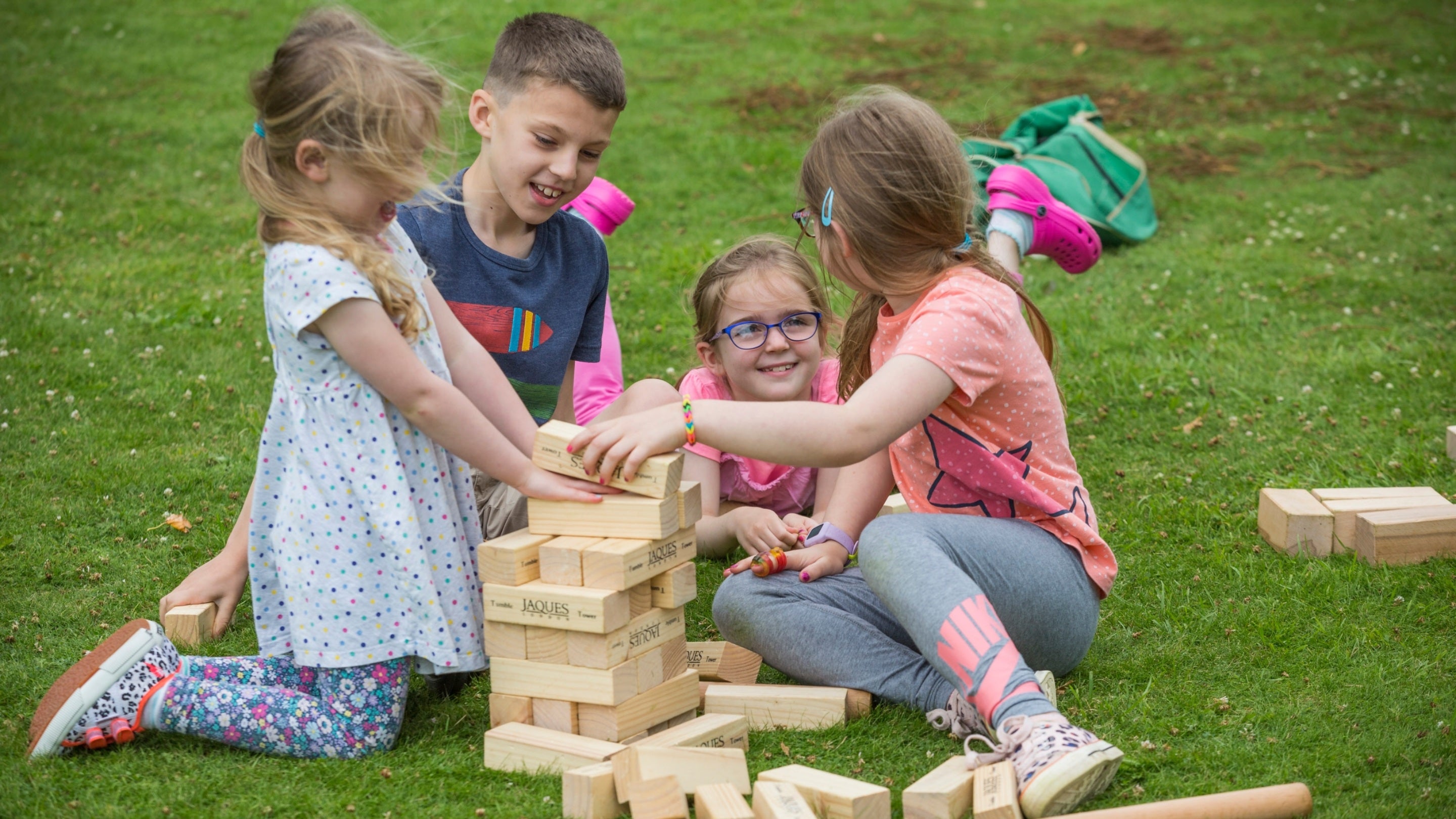 Children playing lawn games in the garden at East Riddlesden Hall