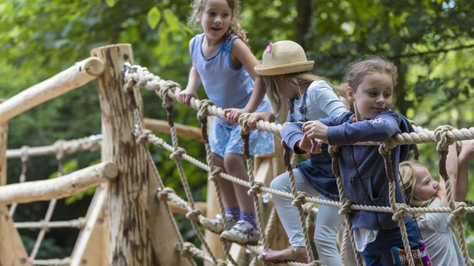 Children explore the playground at Fountains Abbey
