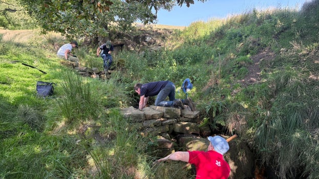 National Trust and Yorkshire Water teams carrying out dam maintenance