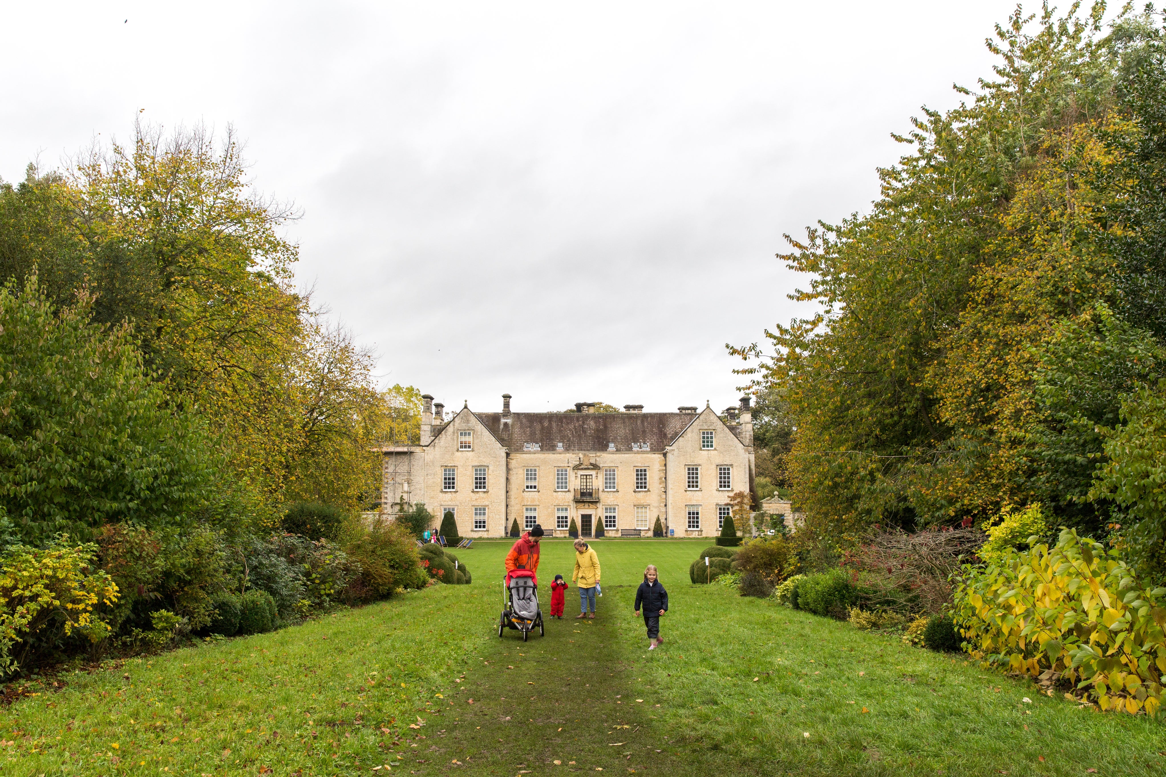 Visitors and the south front of the house at Nunnington Hall, North Yorkshire