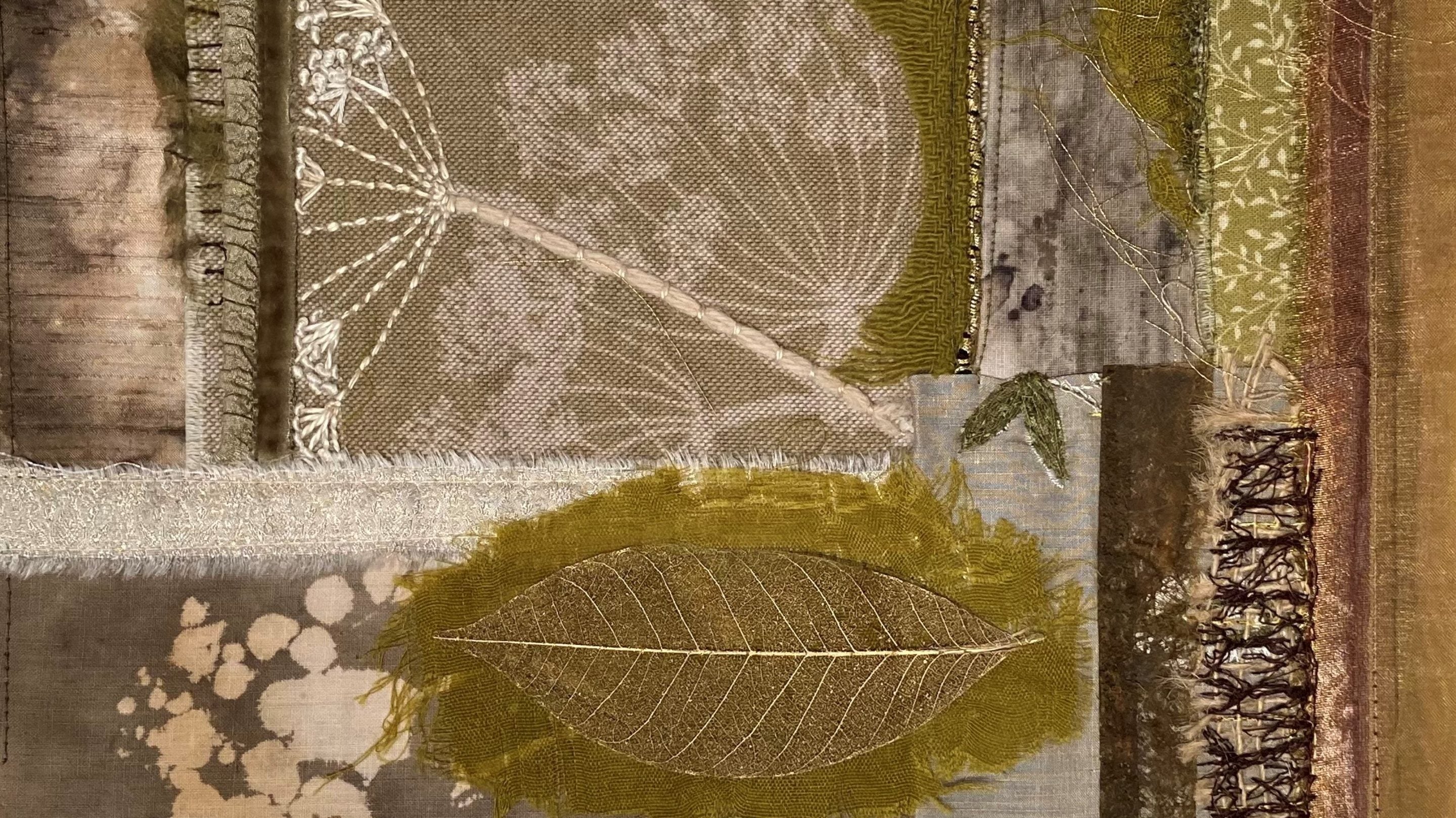 Abstract fabric and embroidery showing leaves and seed heads
