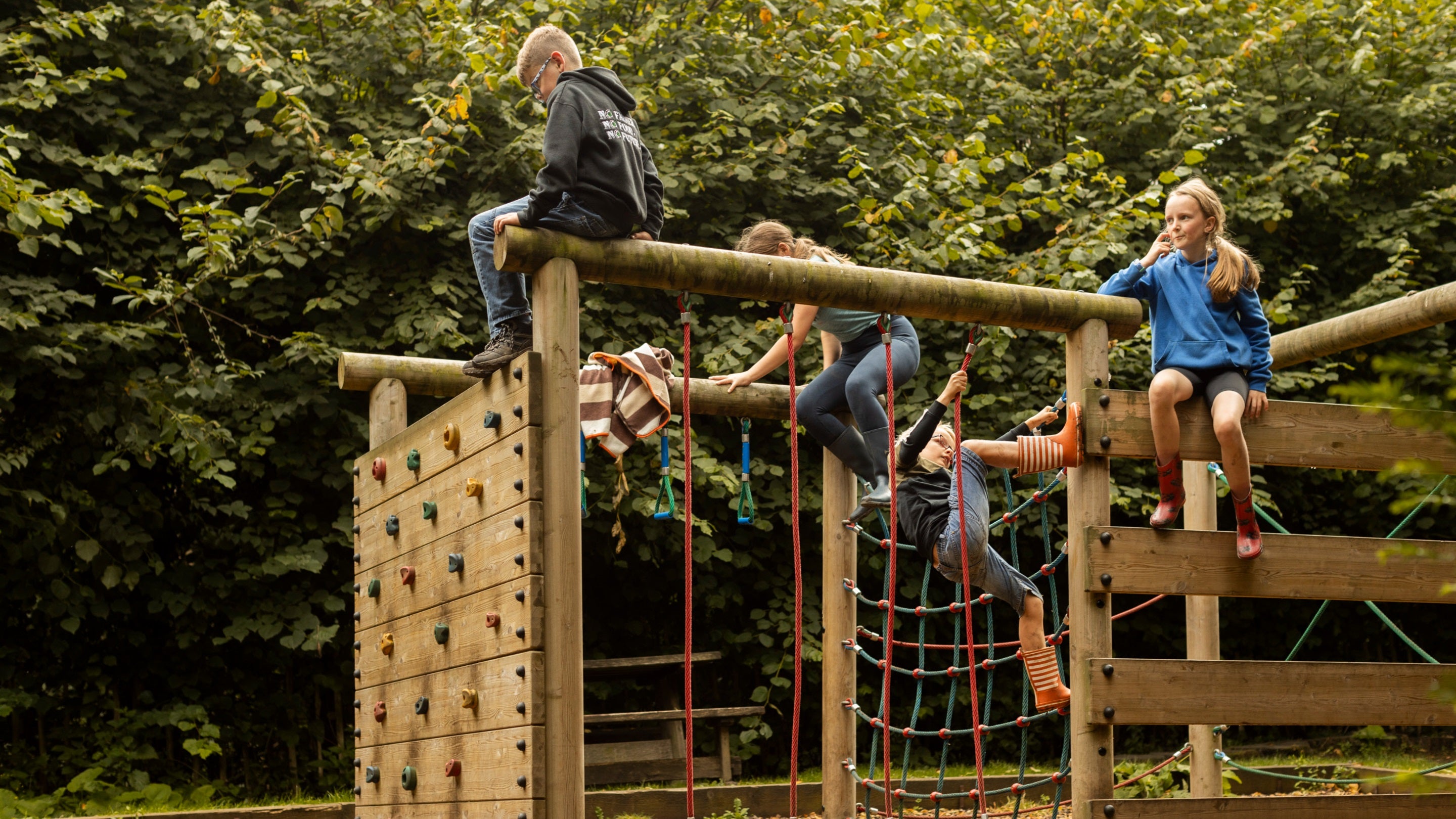 Children enjoying Lion's Den play area at Nunnington Hall