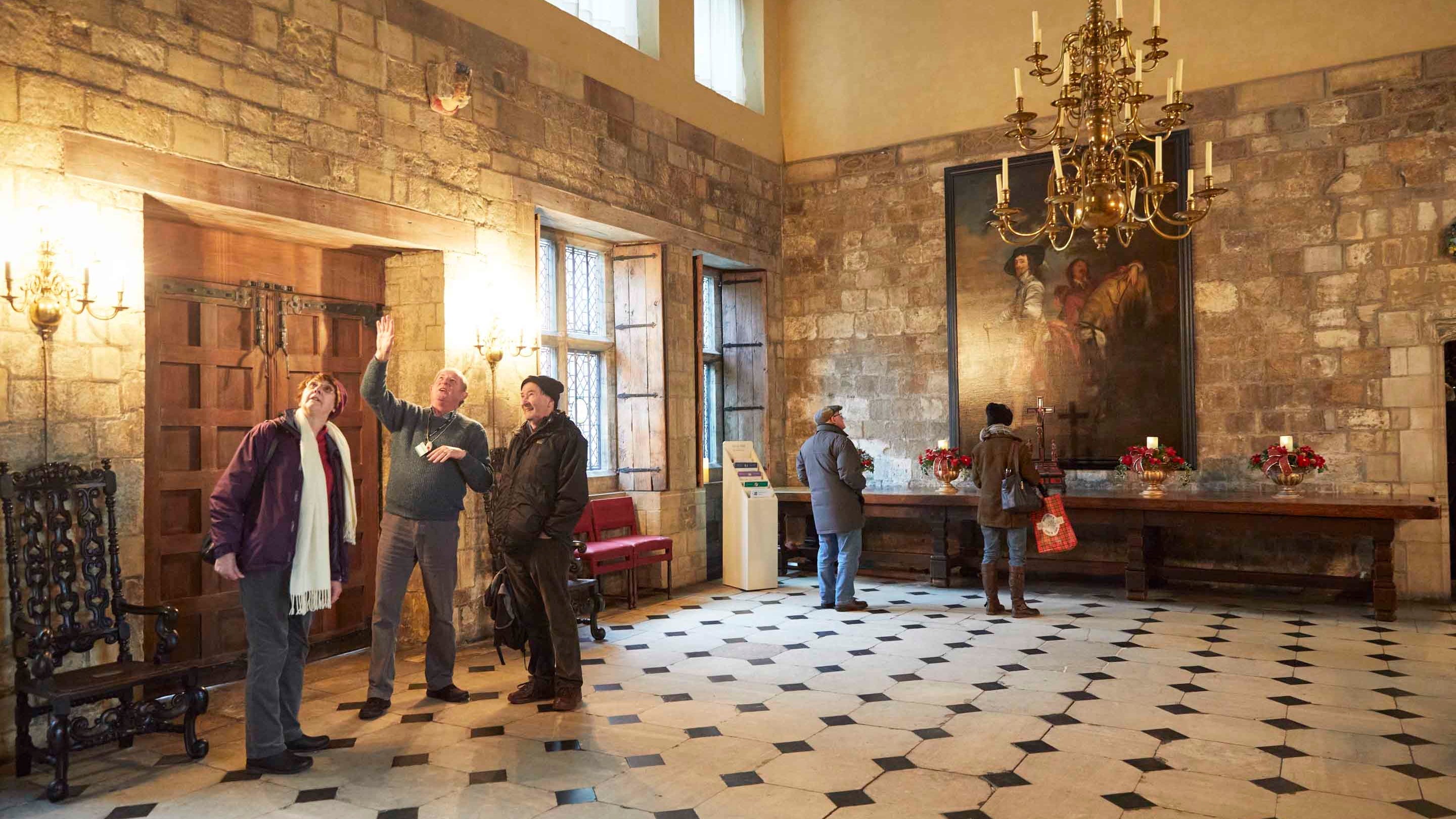 Room guide and visitors in the Hall at Treasurer's House, York