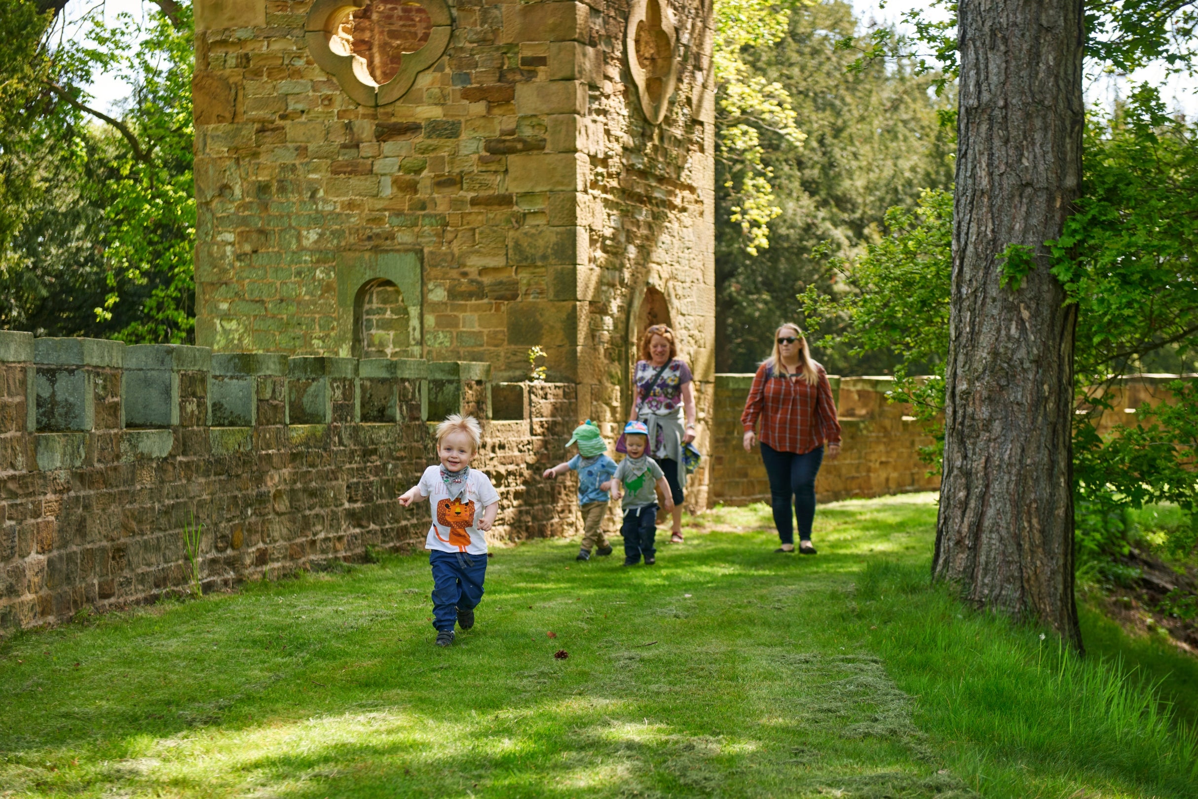 Children exploring the gothic folly 'Stainborough Castle' at Wentworth Castle Gardens
