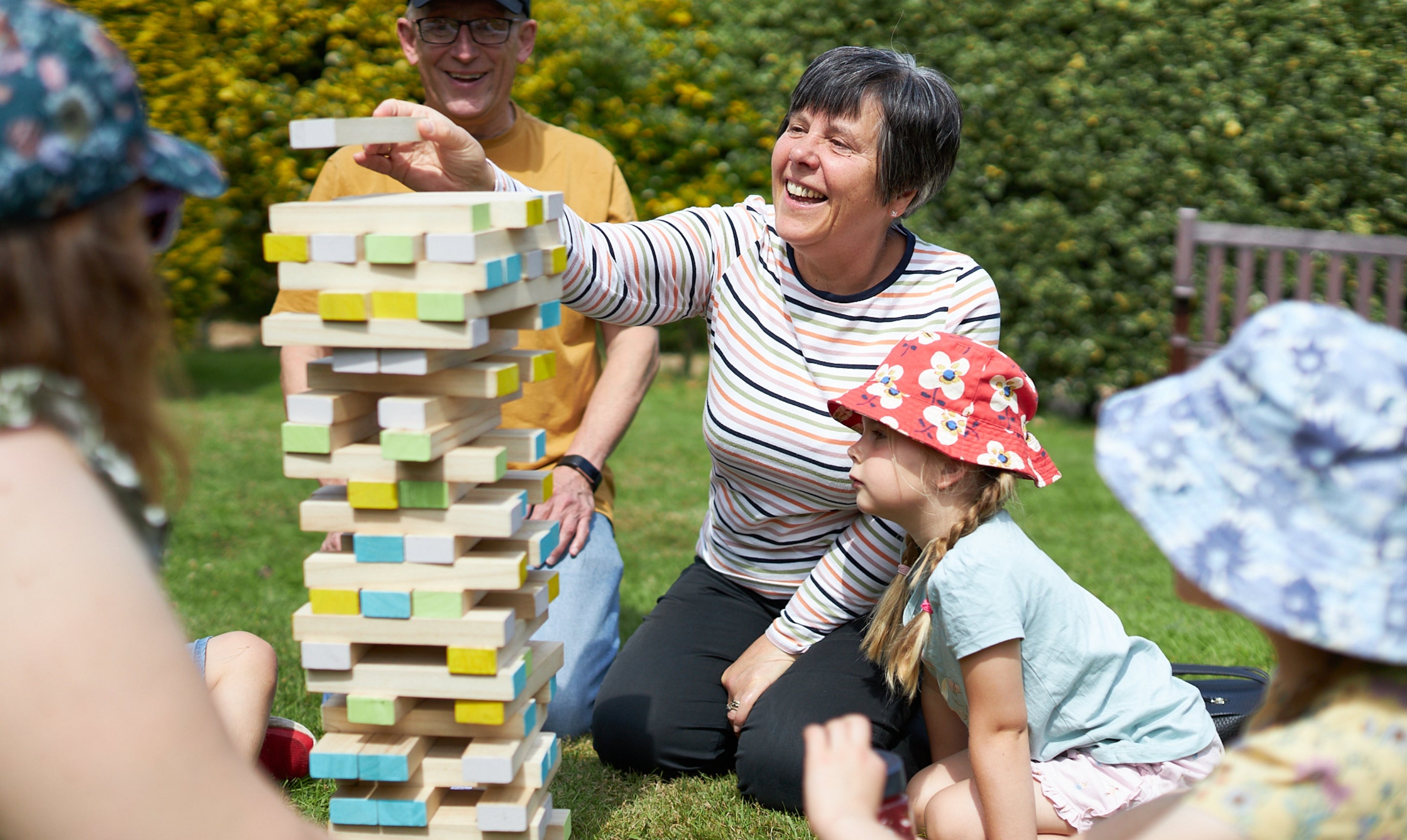 Family playing jenga at Wentworth Castle Gardens