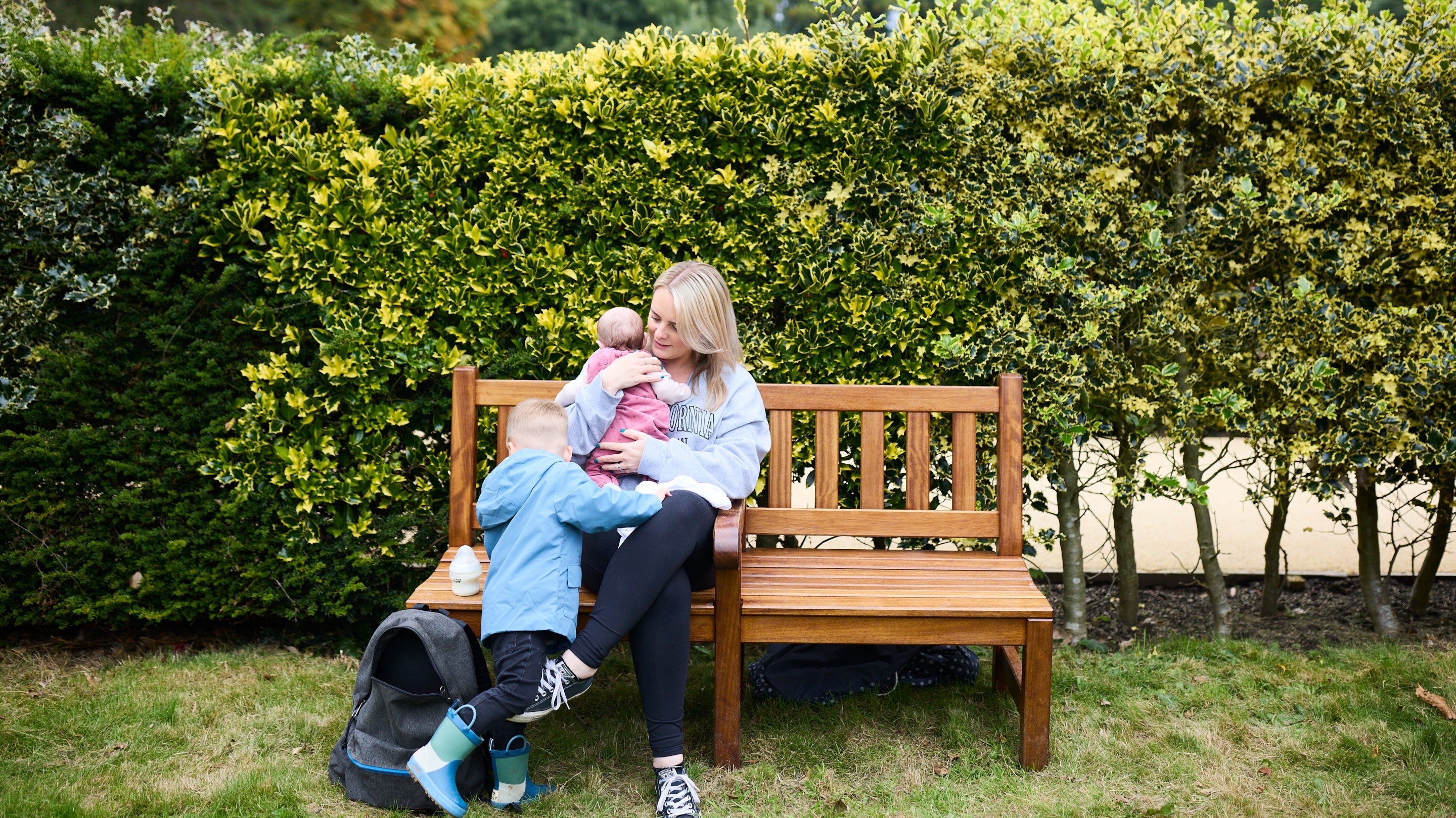 Visitors on a bench in the Union Jack Gardens